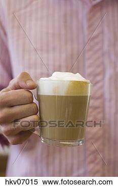 Stock Image - man holding cup 
of coffee. fotosearch 
- search stock 
photos, pictures, 
images, and photo 
clipart