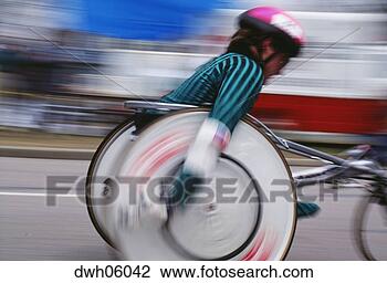 Stock Photo - man racing in 
wheelchair. fotosearch 
- search stock 
photos, pictures, 
images, and photo 
clipart