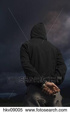 Stock Image - man’s hands clasped 
behind back. fotosearch 
- search stock 
photos, pictures, 
images, and photo 
clipart