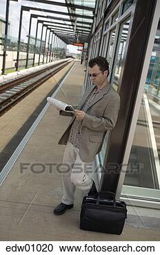 Stock Photography - man waiting for 
train. fotosearch 
- search stock 
photos, pictures, 
images, and photo 
clipart