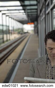 Stock Photography - man waiting for 
train. fotosearch 
- search stock 
photos, pictures, 
images, and photo 
clipart
