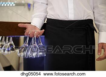 Stock Photo - midsection of 
food server carrying 
wineglasses. fotosearch 
- search stock 
photos, pictures, 
images, and photo 
clipart
