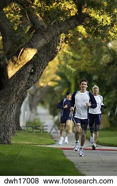 Stock Photo - people jogging 
on suburb sidewalk. 
fotosearch - search 
stock photos, 
pictures, images, 
and photo clipart