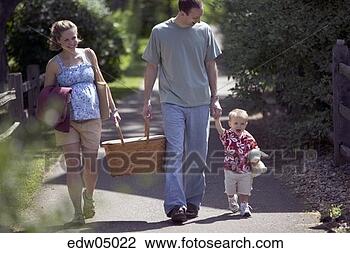 Stock Photo - pregnant woman 
and family having 
picnic. fotosearch 
- search stock 
photos, pictures, 
images, and photo 
clipart