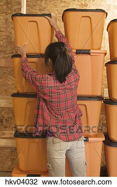 Stock Photo - teenage girl with 
stack of plastic 
containers. fotosearch 
- search stock 
photos, pictures, 
images, and photo 
clipart