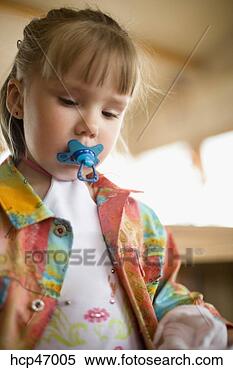 Stock Image - toddler girl sucking 
on a pacifier. 
fotosearch - search 
stock photos, 
pictures, images, 
and photo clipart