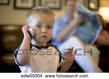 Stock Photo - toddler playing 
with cell phone. 
fotosearch - search 
stock photos, 
pictures, images, 
and photo clipart