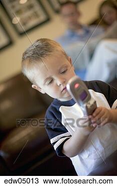 Stock Photo - toddler playing 
with cell phone. 
fotosearch - search 
stock photos, 
pictures, images, 
and photo clipart