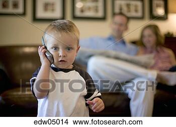 Stock Photo - toddler playing 
with cell phone. 
fotosearch - search 
stock photos, 
pictures, images, 
and photo clipart