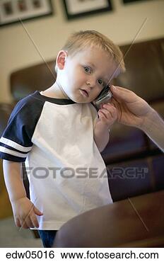 Stock Photo - toddler playing 
with cell phone. 
fotosearch - search 
stock photos, 
pictures, images, 
and photo clipart