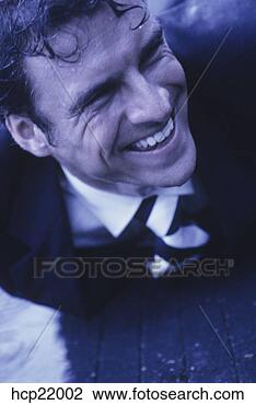 Stock Photo - wet businessman 
smiling. fotosearch 
- search stock 
photos, pictures, 
images, and photo 
clipart