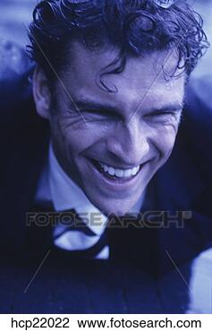 Stock Photo - wet businessman 
smiling. fotosearch 
- search stock 
photos, pictures, 
images, and photo 
clipart