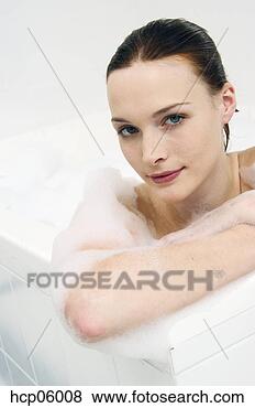 Stock Photo - woman in bubble 
bath. fotosearch 
- search stock 
photos, pictures, 
images, and photo 
clipart