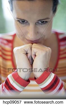 Picture - woman with chin 
on hands. fotosearch 
- search stock 
photos, pictures, 
images, and photo 
clipart