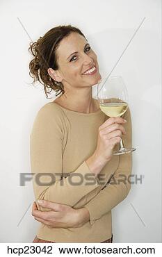 Stock Photo - woman drinking 
white wine. fotosearch 
- search stock 
photos, pictures, 
images, and photo 
clipart