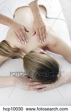 Stock Photography - woman getting 
back massage. 
fotosearch - search 
stock photos, 
pictures, images, 
and photo clipart