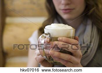 Stock Photo - woman holding 
cup of coffee. 
fotosearch - search 
stock photos, 
pictures, images, 
and photo clipart