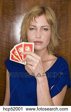 Stock Photography - woman holding 
playing cards. 
fotosearch - search 
stock photos, 
pictures, images, 
and photo clipart