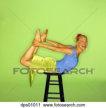 Stock Photography - woman laying on 
stool. fotosearch 
- search stock 
photos, pictures, 
images, and photo 
clipart