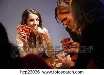 Stock Photo - woman playing 
poker with friends. 
fotosearch - search 
stock photos, 
pictures, images, 
and photo clipart