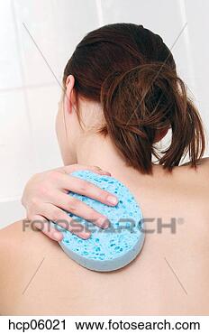 Stock Photography - woman scrubbing 
back. fotosearch 
- search stock 
photos, pictures, 
images, and photo 
clipart