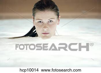 Stock Photo - woman submerged 
in hot tub. fotosearch 
- search stock 
photos, pictures, 
images, and photo 
clipart