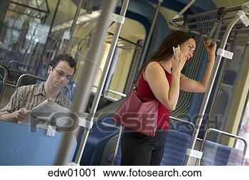 Stock Photography - woman talking 
on cell phone 
on public bus. 
fotosearch - search 
stock photos, 
pictures, images, 
and photo clipart