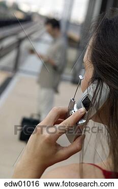 Stock Photo - woman talking 
on cell phone. 
fotosearch - search 
stock photos, 
pictures, images, 
and photo clipart