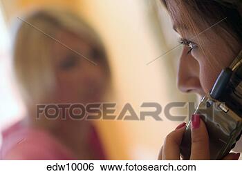 Stock Photo - woman talking 
on cell phone. 
fotosearch - search 
stock photos, 
pictures, images, 
and photo clipart