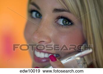 Stock Photograph - woman talking 
on cell phone. 
fotosearch - search 
stock photos, 
pictures, images, 
and photo clipart