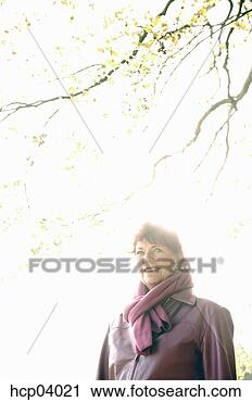 Stock Photography - woman wearing 
warm clothing 
outdoors. fotosearch 
- search stock 
photos, pictures, 
images, and photo 
clipart