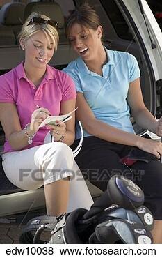 Stock Photo - women tallying 
golf scores. fotosearch 
- search stock 
photos, pictures, 
images, and photo 
clipart
