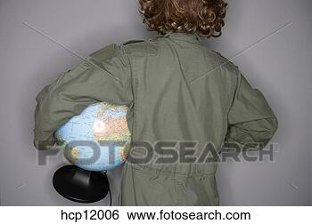 Stock Photo - young boy in jumpsuit 
holding globe. 
fotosearch - search 
stock photos, 
pictures, images, 
and photo clipart