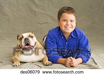 Stock Photograph - young boy posing 
with dog. fotosearch 
- search stock 
photos, pictures, 
images, and photo 
clipart