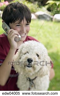 Stock Image - young boy talking 
on cell phone. 
fotosearch - search 
stock photos, 
pictures, images, 
and photo clipart