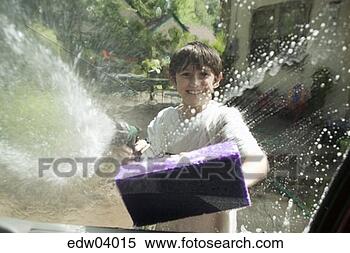 Stock Image - young boy washing 
the car. fotosearch 
- search stock 
photos, pictures, 
images, and photo 
clipart