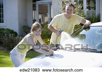 Stock Photo - young couple washing 
car. fotosearch 
- search stock 
photos, pictures, 
images, and photo 
clipart