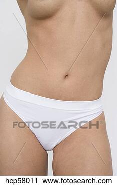 Stock Photography - young semi-nude 
woman in underwear. 
fotosearch - search 
stock photos, 
pictures, images, 
and photo clipart
