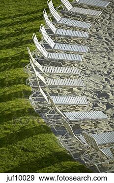 Stock Photograph - aerial view of 
lawn chairs by 
beach. fotosearch 
- search stock 
photos, pictures, 
images, and photo 
clipart
