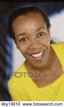 Stock Photography - african woman 
smiling. fotosearch 
- search stock 
photos, pictures, 
images, and photo 
clipart