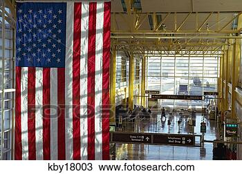 Stock Photo - american flag 
hanging in airport, 
reagan international 
airport. fotosearch 
- search stock 
photos, pictures, 
images, and photo 
clipart