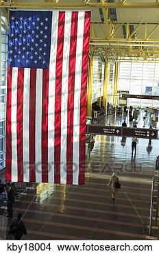 Stock Photo - american flag 
hanging in airport, 
reagan international 
airport. fotosearch 
- search stock 
photos, pictures, 
images, and photo 
clipart