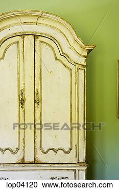Stock Photography - antique white 
armoire with green 
wall. fotosearch 
- search stock 
photos, pictures, 
images, and photo 
clipart