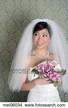 Stock Photo - asian bride in 
veil and wedding 
dress. fotosearch 
- search stock 
photos, pictures, 
images, and photo 
clipart