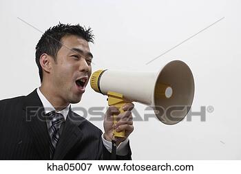 Picture - asian businessman 
using bullhorn. 
fotosearch - search 
stock photos, 
pictures, images, 
and photo clipart