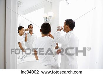 Stock Photo - asian father and 
son brushing teeth. 
fotosearch - search 
stock photos, 
pictures, images, 
and photo clipart