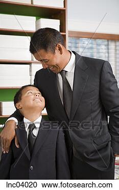 Stock Photography - asian father and 
son wearing suits. 
fotosearch - search 
stock photos, 
pictures, images, 
and photo clipart