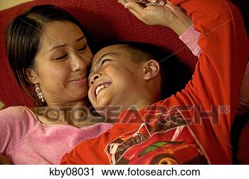 Stock Photography - asian mother and 
son laughing. 
fotosearch - search 
stock photos, 
pictures, images, 
and photo clipart