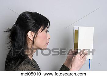 Stock Photography - asian woman reading 
book. fotosearch 
- search stock 
photos, pictures, 
images, and photo 
clipart