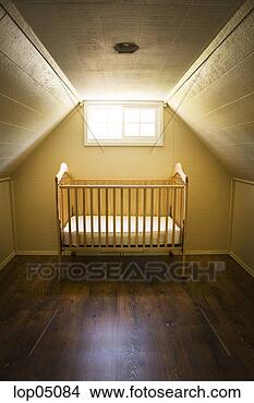 Stock Photo - baby's crib alone 
in attick room. 
fotosearch - search 
stock photos, 
pictures, images, 
and photo clipart